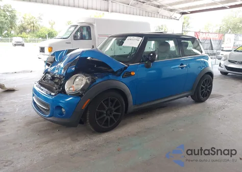 2011 Mini Cooper z USA, uszkodzony, nr VIN WMWSU3C50BT253145